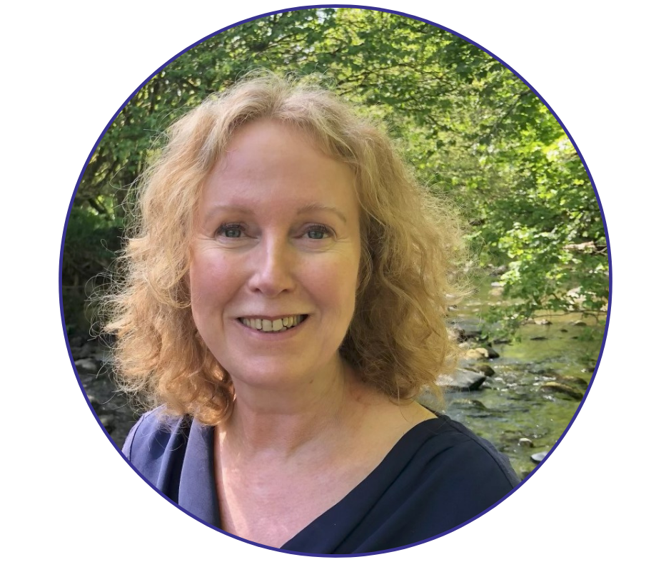 Jo Green, Inspired To Change solution-focused hypnotherapist in Stirling and Bridge of Allan, smiling beside a woodland river.